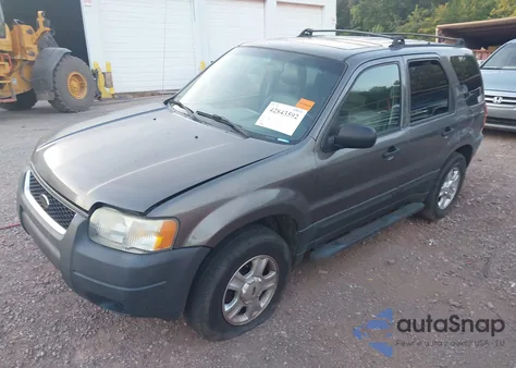 2003 Ford Escape Xlt z USA, uszkodzony, nr VIN 1FMCU03123KA61568